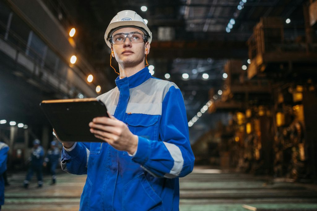 Field worker using a rugged tablet