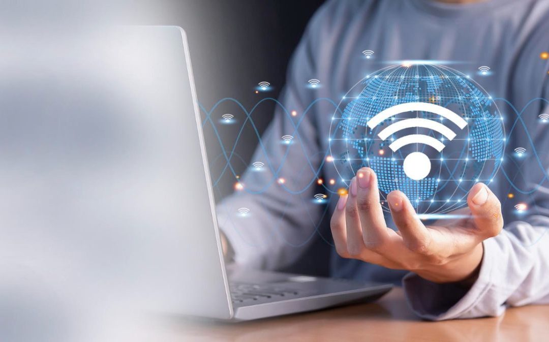 Engineer holding a Wi-Fi network icon