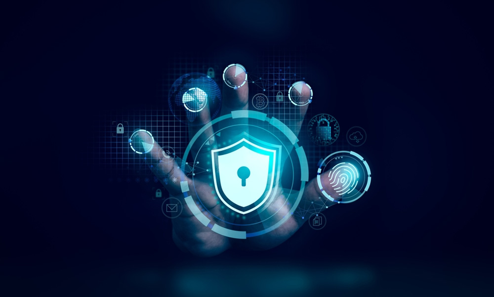 Hand holding a glowing security shield